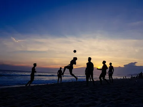 Altinha / keepie uppie player on a beach